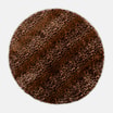 Okrągły dywan w stylu animal print prezentowany w całości.