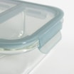 Zbliżenie na pokrywkę lunchboxa dripstop z silikonową uszczelką oraz bocznymi zatrzaskami.