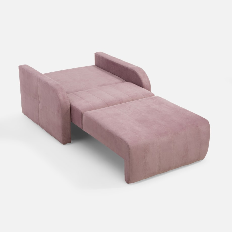 Sofa alaska rozłożona do funkcji spania na jasnym tle.