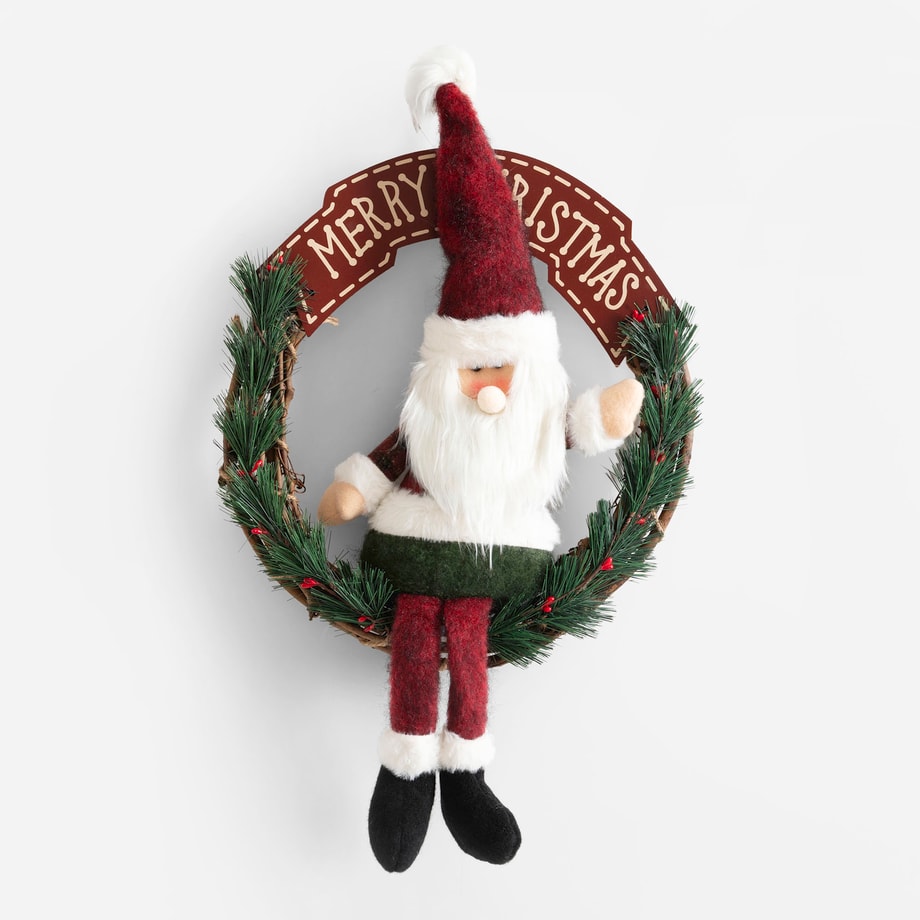 Wianek świąteczny z mikołajem i napisem Merry Christmas widoczny w całości.