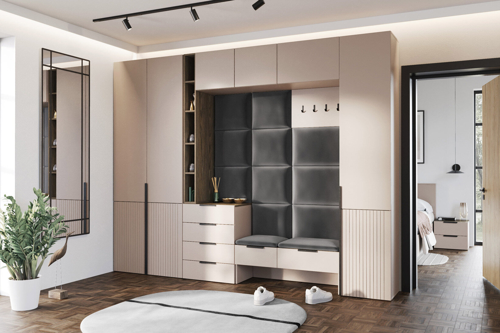 Nowoczesna zabudowa do przedpokoju z pojemnymi szafami, tapicerowanym siedziskiem, wieszakami ściennymi oraz szafkami do przechowywania, urządzona w eleganckim stylu z beżowymi i czarnymi akcentami.